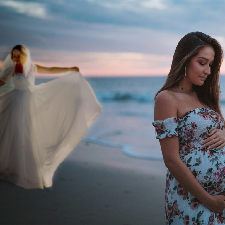 pregnant bridesmaid on a beach while bride poses in gown behind her during sunset